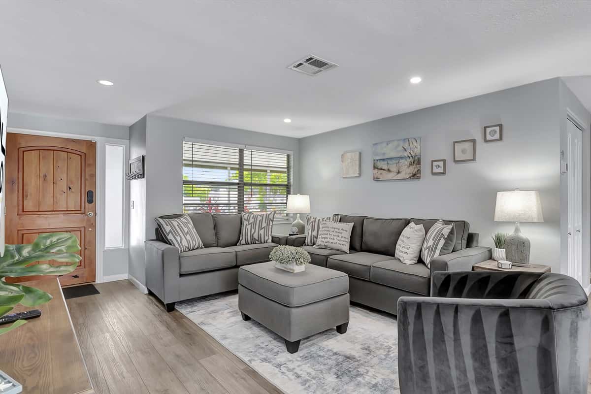 Step into our inviting living room, a spacious haven bathed in abundant natural light.