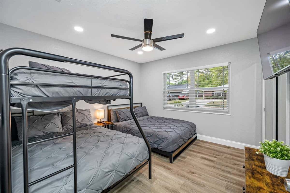 Bringing your kids on this trip? This room would be amazing for them to have! This bedroom has a king size bed and a bunk bed!