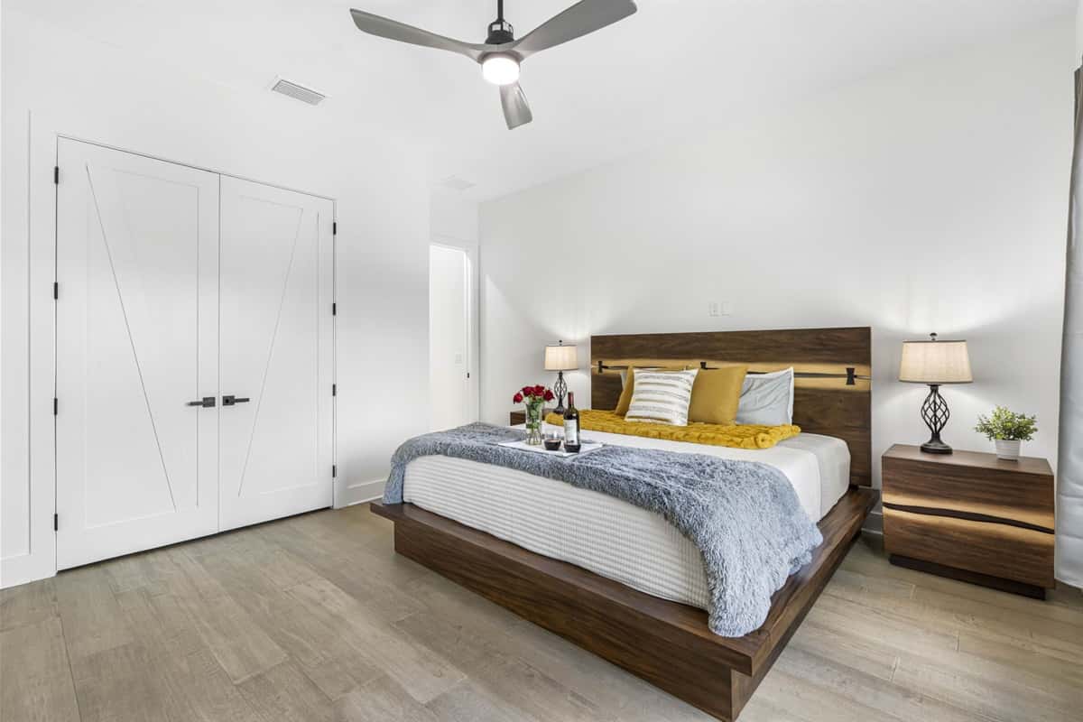 Another spacious retreat, this king bedroom also offers a king bed and is tastefully decorated with soft tones and cozy furnishings.