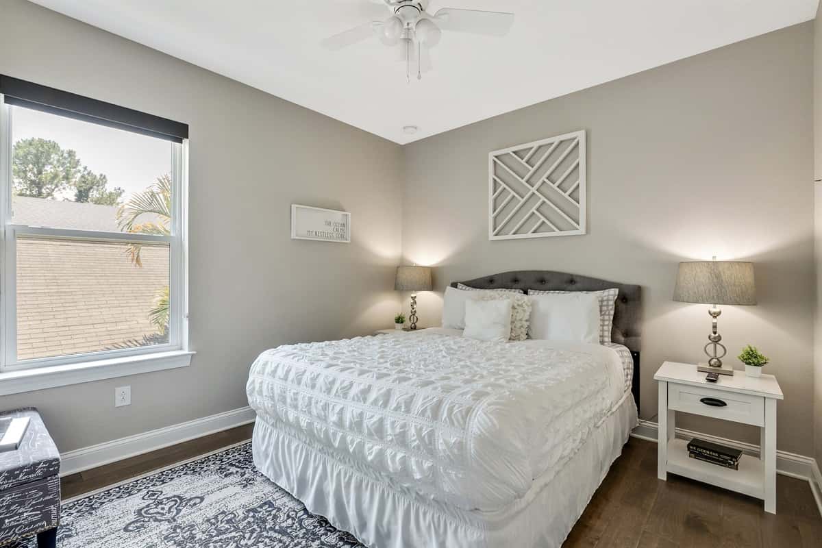 Step into the sanctuary of our master bedroom, where luxury and comfort blend seamlessly to create a regal retreat.