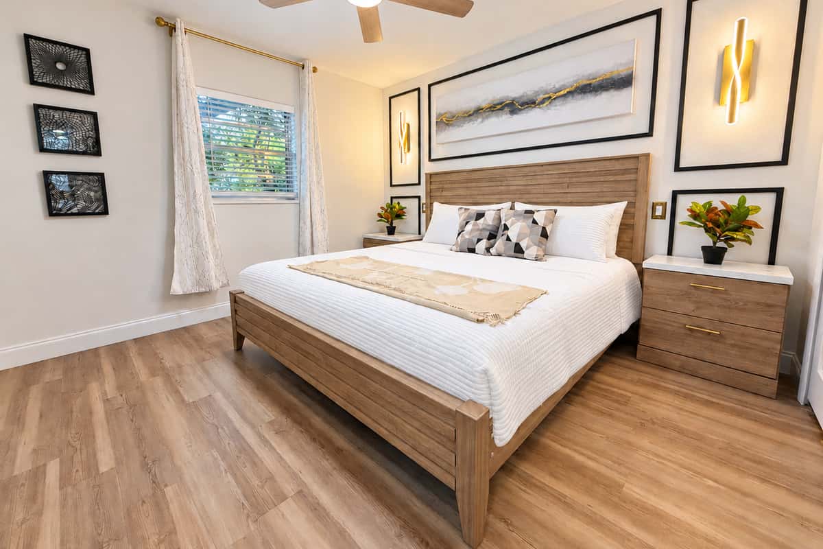 Sink into a king bed after a day in the sun. Bedroom 1 pairs a king bed with soft wall sconces, a smart TV and ceiling fan. A calm retreat after Tampa outings, Gulf beach drives or a night by the fire pit.