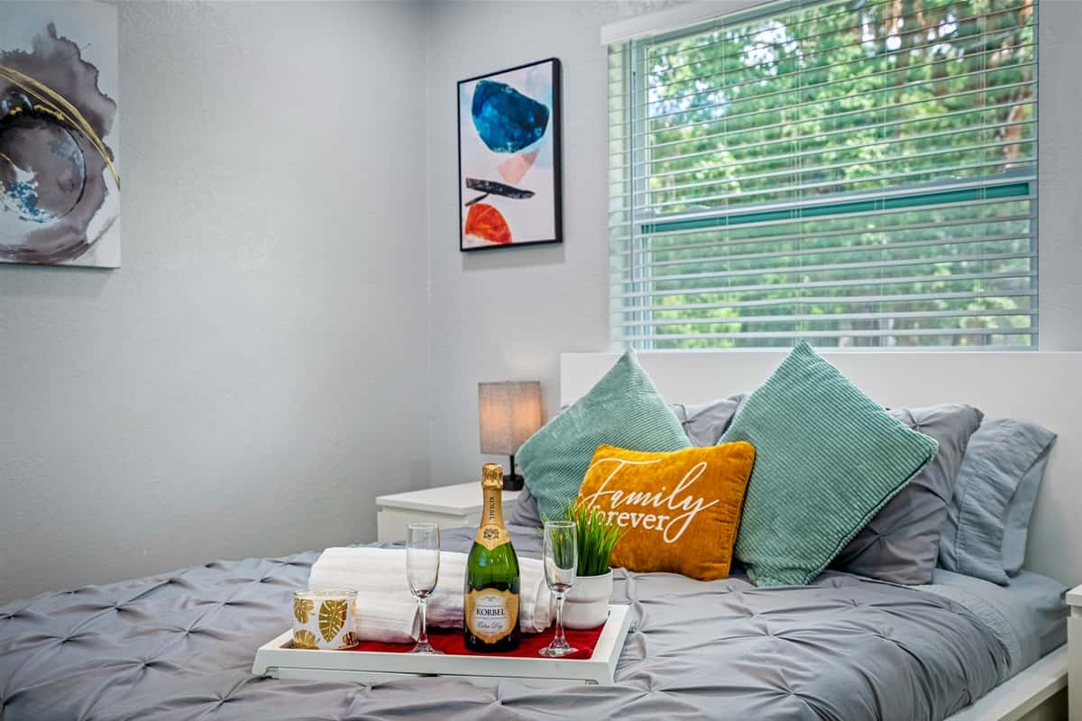 Exquisite bedroom with queen size bed, drawers, full sized mirror closet, and smart TV. Feel comfortable during your stay while making wonderful memories with family and friends. Don't hesitate to send us an inquiry about the property now!