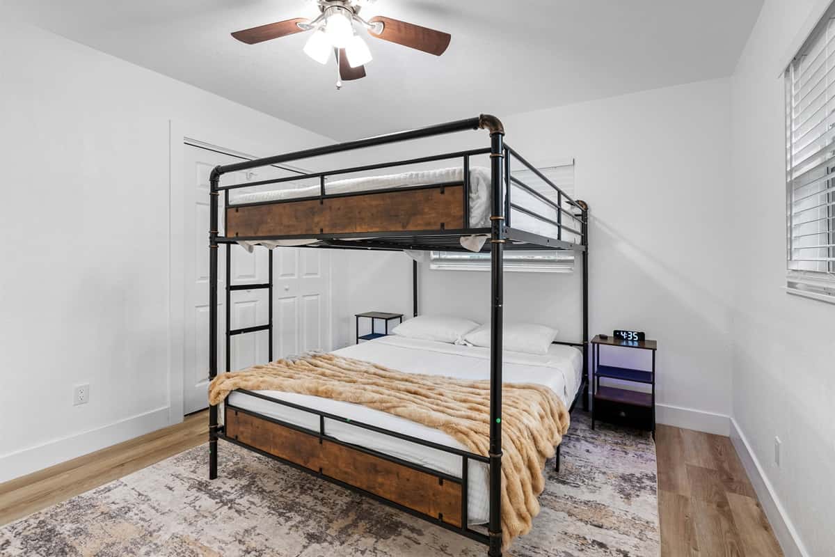Fun meets function in this stylish bunk room—ideal for siblings, cousins, or guests looking to share a space without sacrificing comfort.