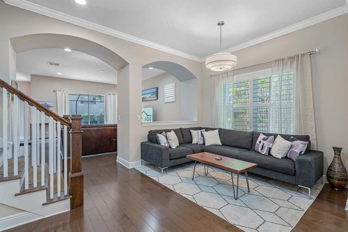 Our stunning living area with high ceilings will welcome you once you enter the property. It has a gorgeous sofa set where you can chill and share great memories with family and friends. Send us  message for more information!