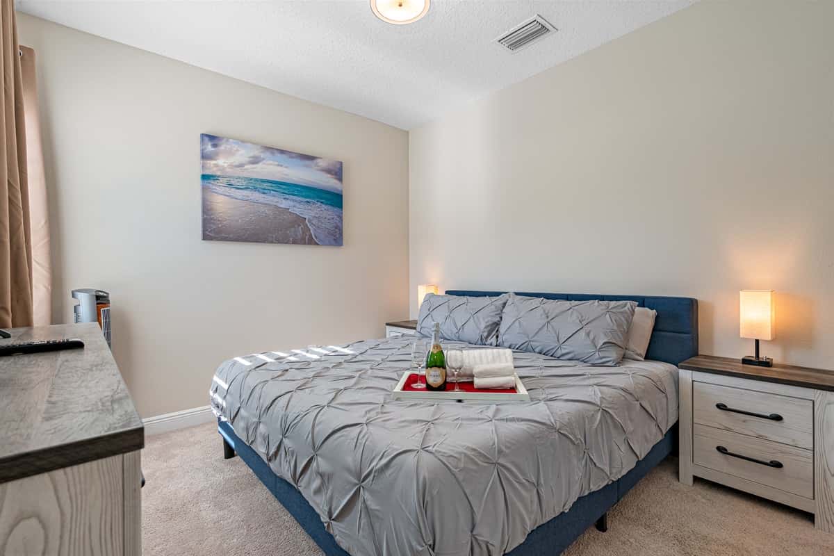 Comfortable bedroom with king size bed and smart TV. Feel safe and comfortable during your stay while making beautiful memories with family and friends. Don't hesitate to send us an inquiry about the property now!