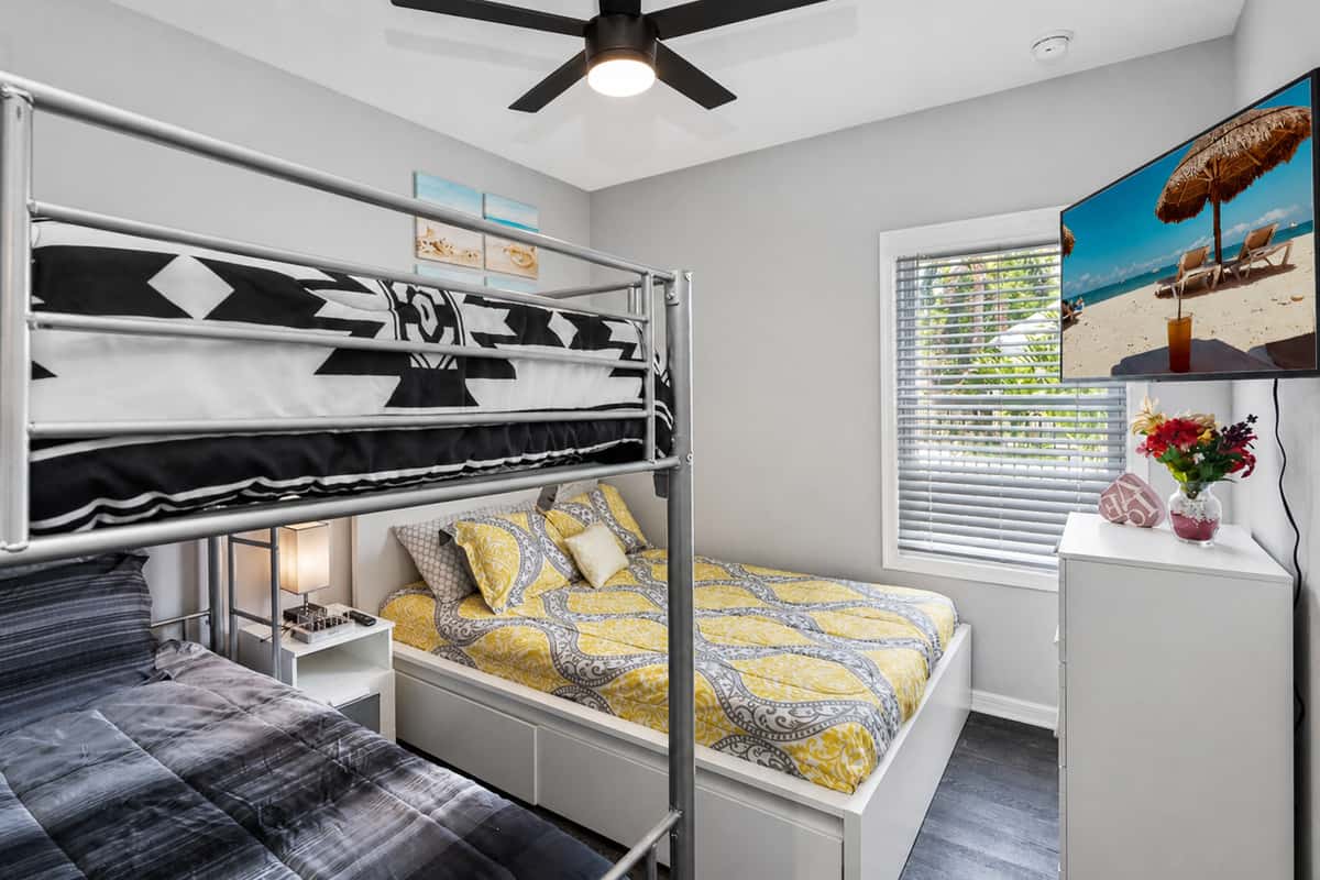 This bedroom is perfect for a small family or a group of friends who wants to hang out and sleep in one room. It is very spacious and has a very nice view.