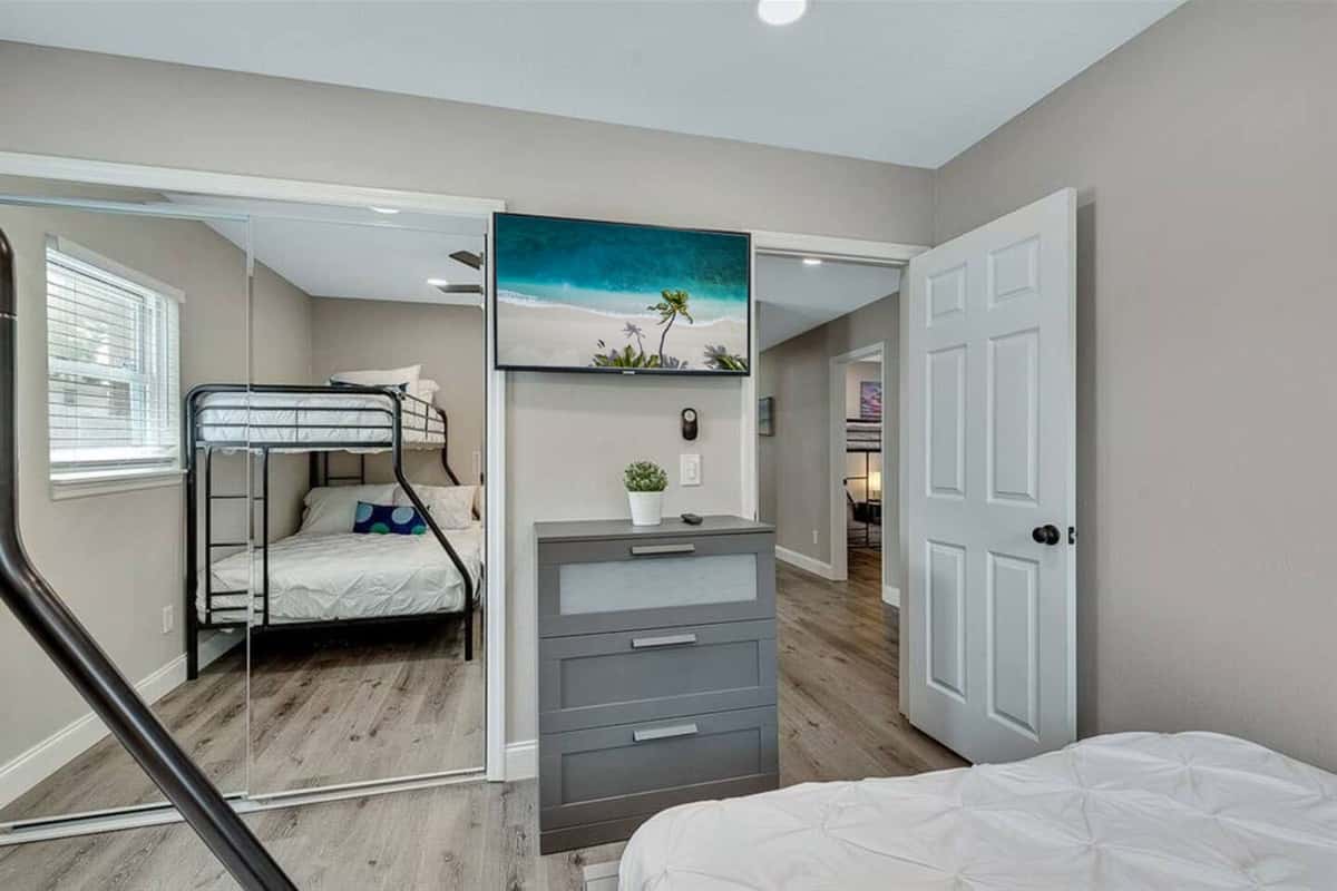 Our wonderful bedroom with a comfortable huge bed, and a bunk bed. This room also has its own TV.  Feel at home in your home away from home. 