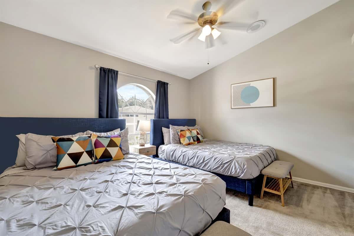 This bedroom is a haven where style meets functionality, offering you a peaceful and organized space to unwind and recharge.
