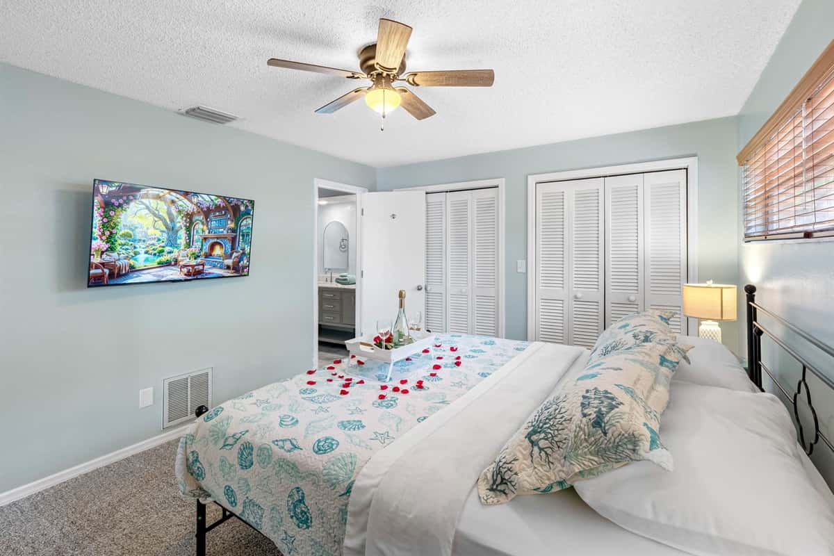 This bedroom is thoughtfully designed to offer a luxurious and restful retreat, perfect for unwinding after a long day of fun or travel.