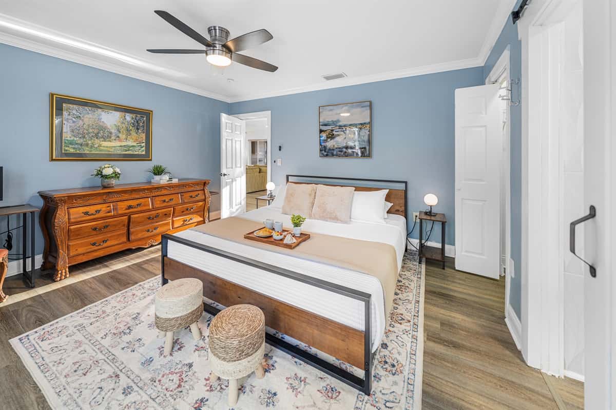 A beautifully styled bedroom with a king-size bed, perfect for a comfortable and relaxing stay.