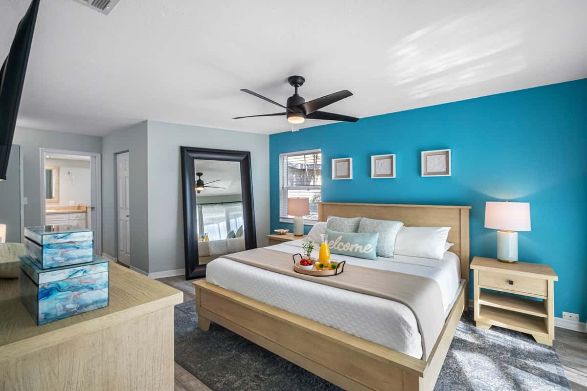 This stylish bedroom blends comfort and sophistication, offering a king bed, ensuite bathroom, and a peaceful atmosphere.
