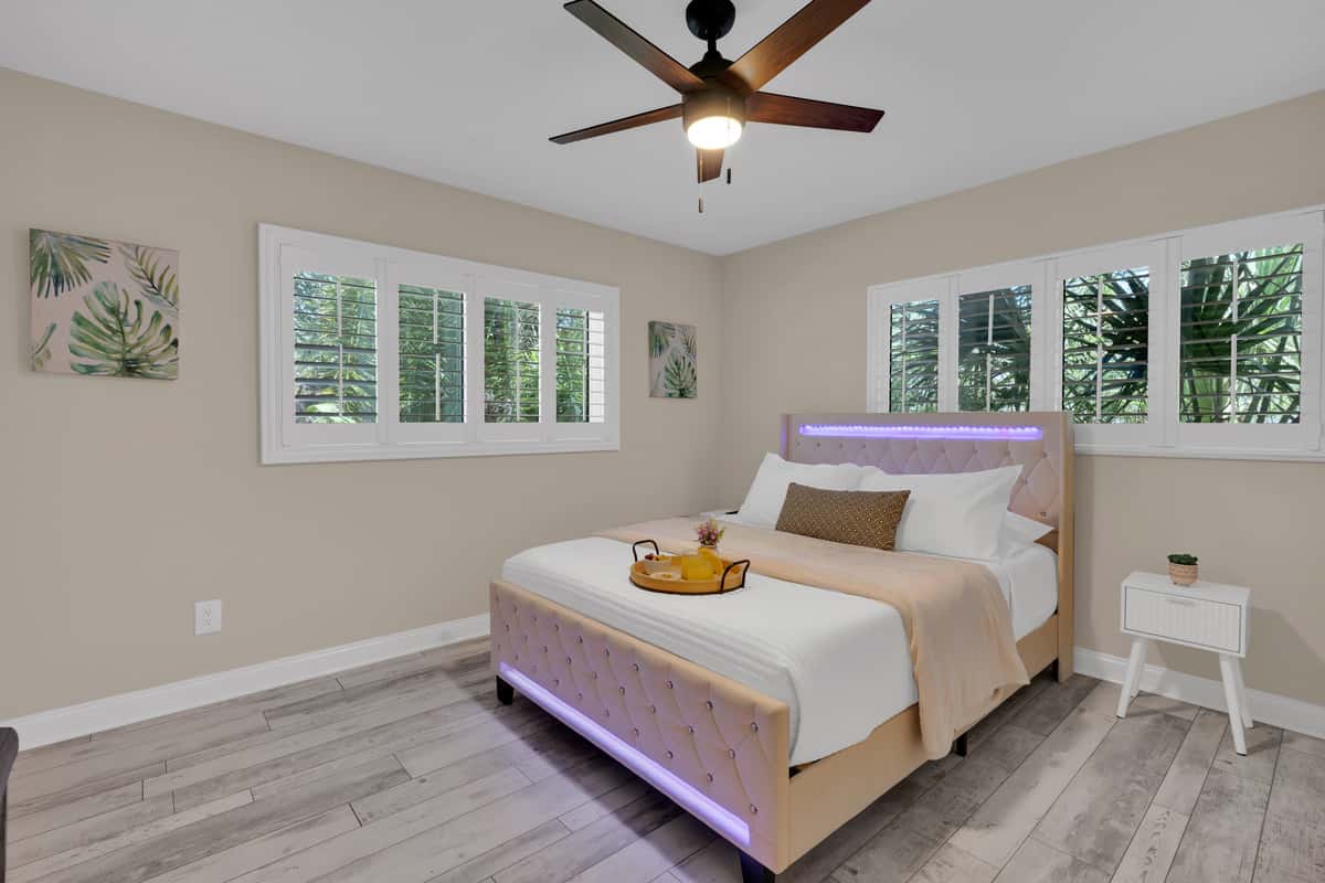 A subtle LED accent under the headboard gives this bedroom a modern nighttime glow