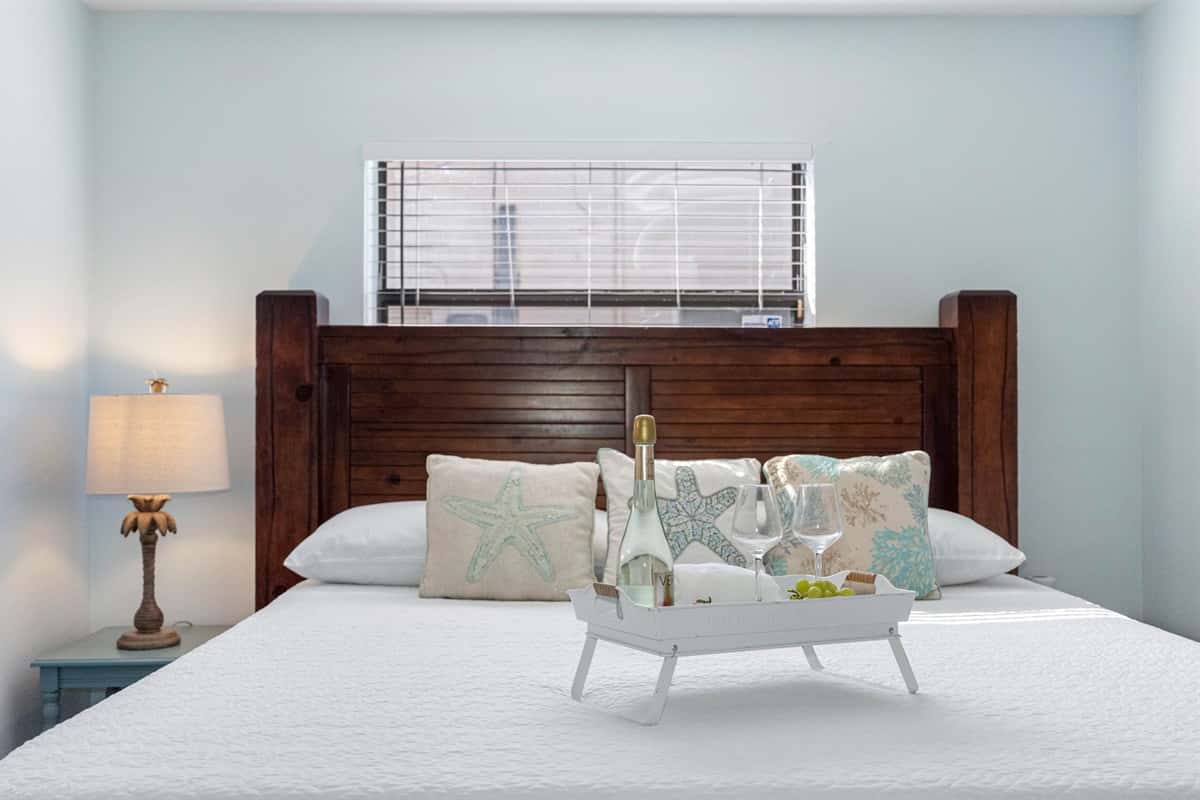 Thoughtfully furnished, the room includes nightstands with soft lighting, a dresser for ample storage, and a spacious closet to accommodate your belongings.