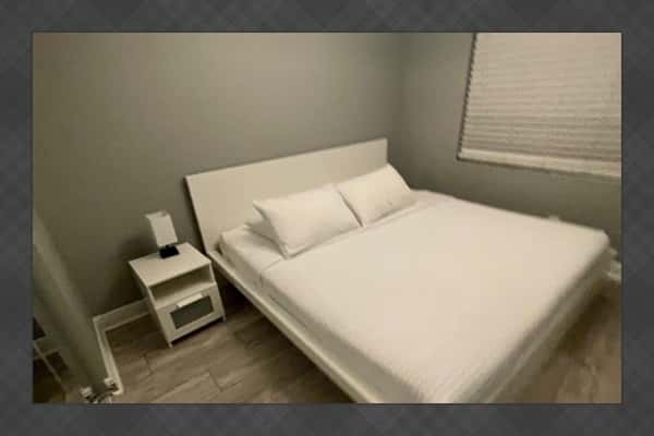 Features a spacious king-size bed and a clean, modern design. Soft lighting, neutral tones, and simple décor create a cozy and relaxing atmosphere. *Updated photos will be uploaded soon!