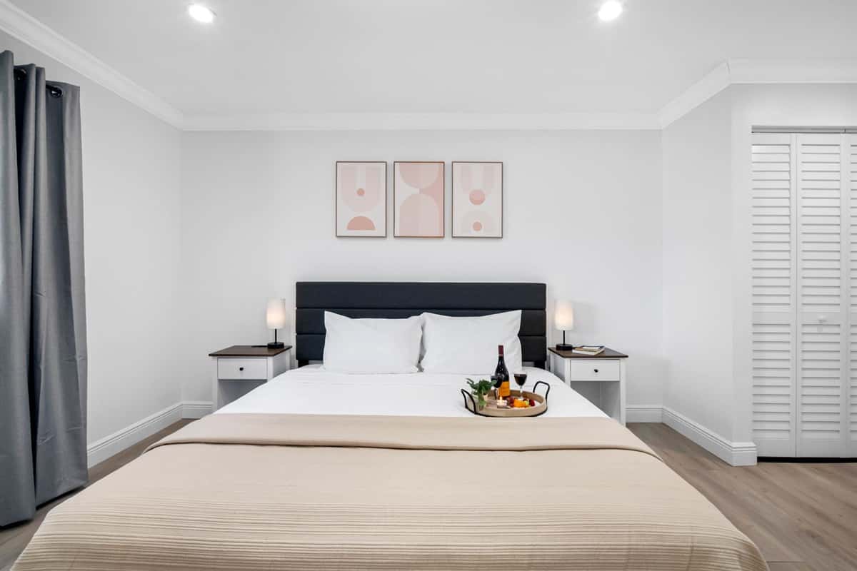 This bedroom doesn’t just look great—it’s designed for comfort, productivity, and total relaxation.