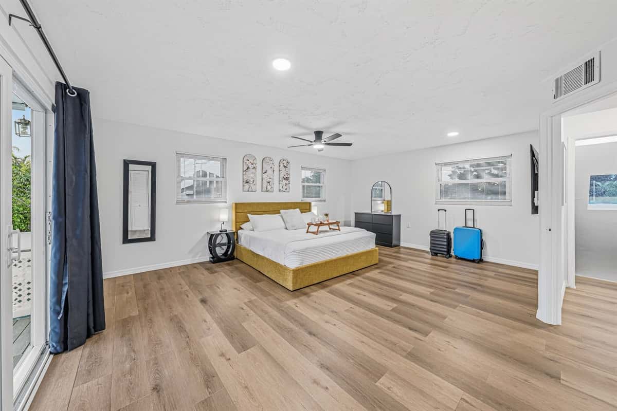 Expansive bedroom retreat with a king bed, open layout, and plenty of space to unwind comfortably 