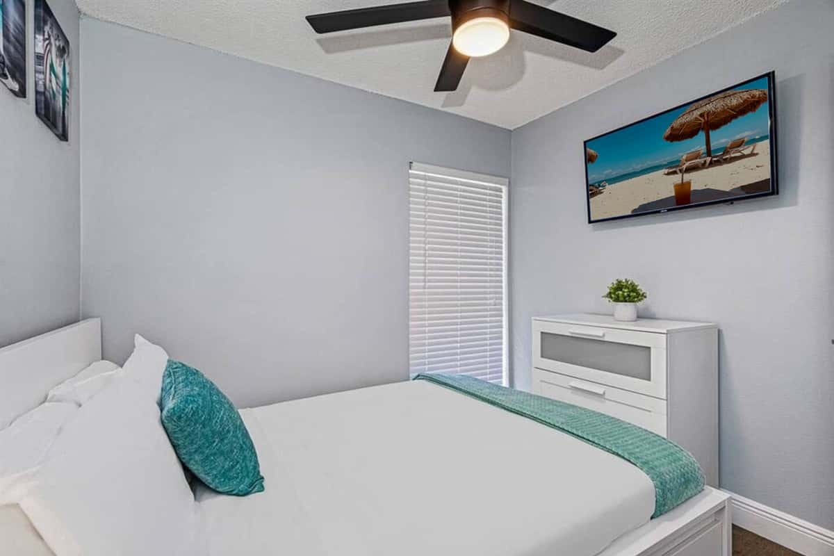 This lovely room has a queen-size bed, drawers, and its own TV. Who wouldn't want a comfortable room to rest in after a long day at the beach? If you like what you see so far, send us a messag