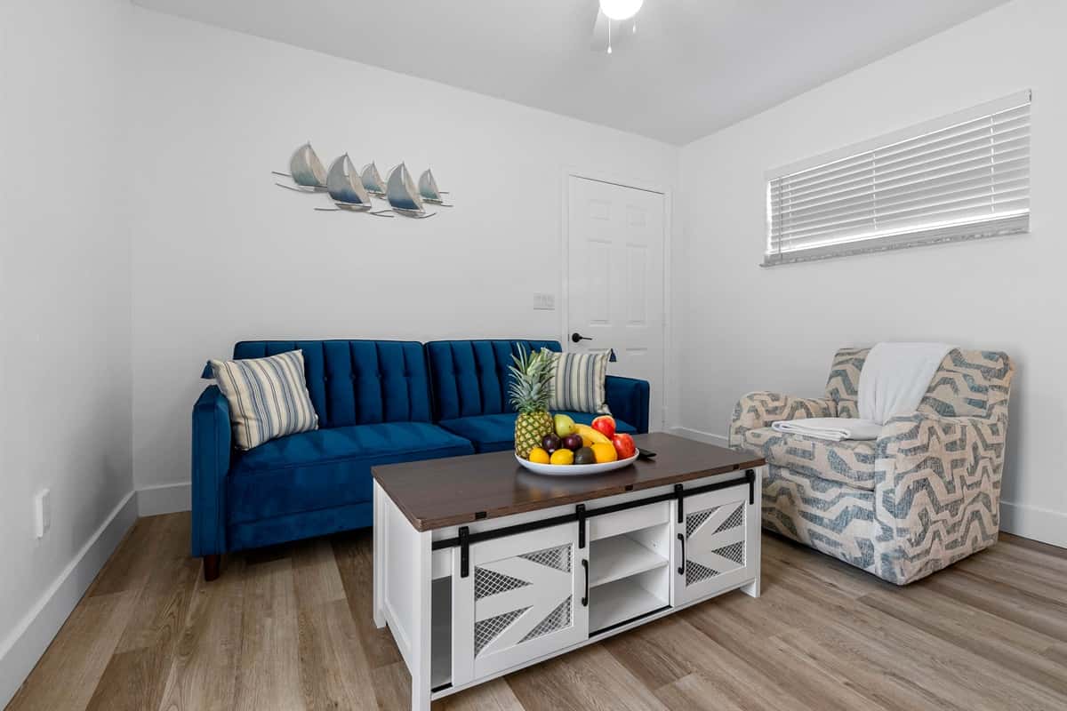 Chic and private studio suite with everything you need—comfy queen bed, kitchenette, cozy lounge, and smart TV.