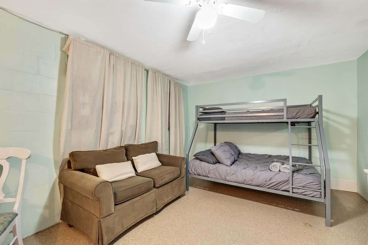 Embark on an extraordinary experience as you enter this exceptional bedroom, carefully curated to offer a perfect blend of comfort and entertainment.