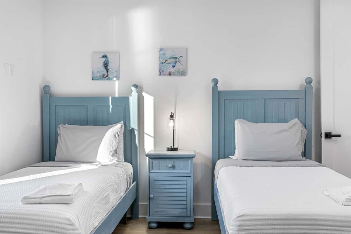This bedroom offers two twin beds and is set up to provide a comfortable and relaxing environment for everyone.