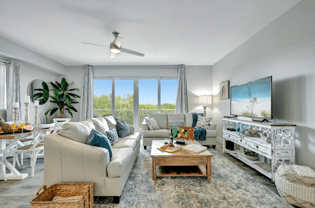 Step into a realm of serene comfort and effortless elegance as you enter the living room of this picturesque abode.