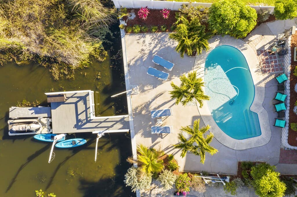 Adjacent to the dock, you will find our inviting pool area, meticulously designed for relaxation and enjoyment.