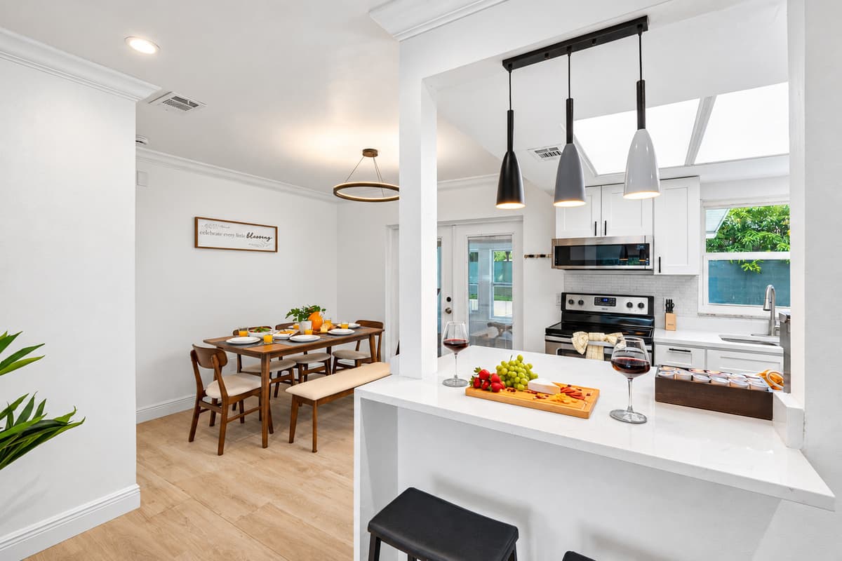 Enjoy the ease and performance of updated stainless steel appliances—including a full-size fridge and glass cooktop.