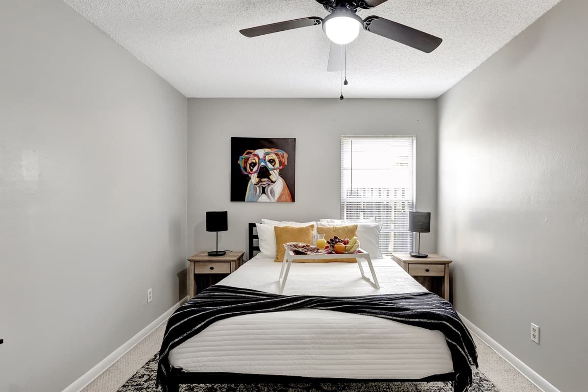Discover serenity in second bedroom, where comfort meets style.
