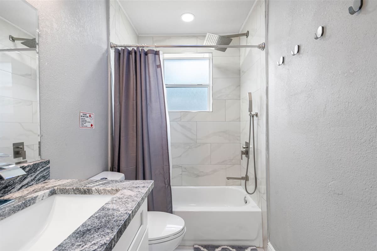 Step into a sanctuary of relaxation and rejuvenation in our elegantly designed bathroom.