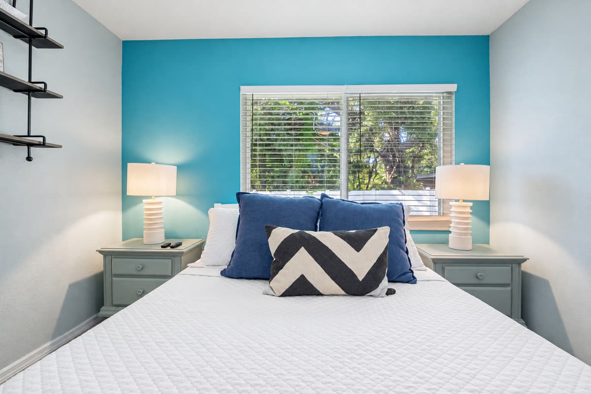 A cozy and stylish queen retreat offering comfort, calm, and the perfect place to recharge.