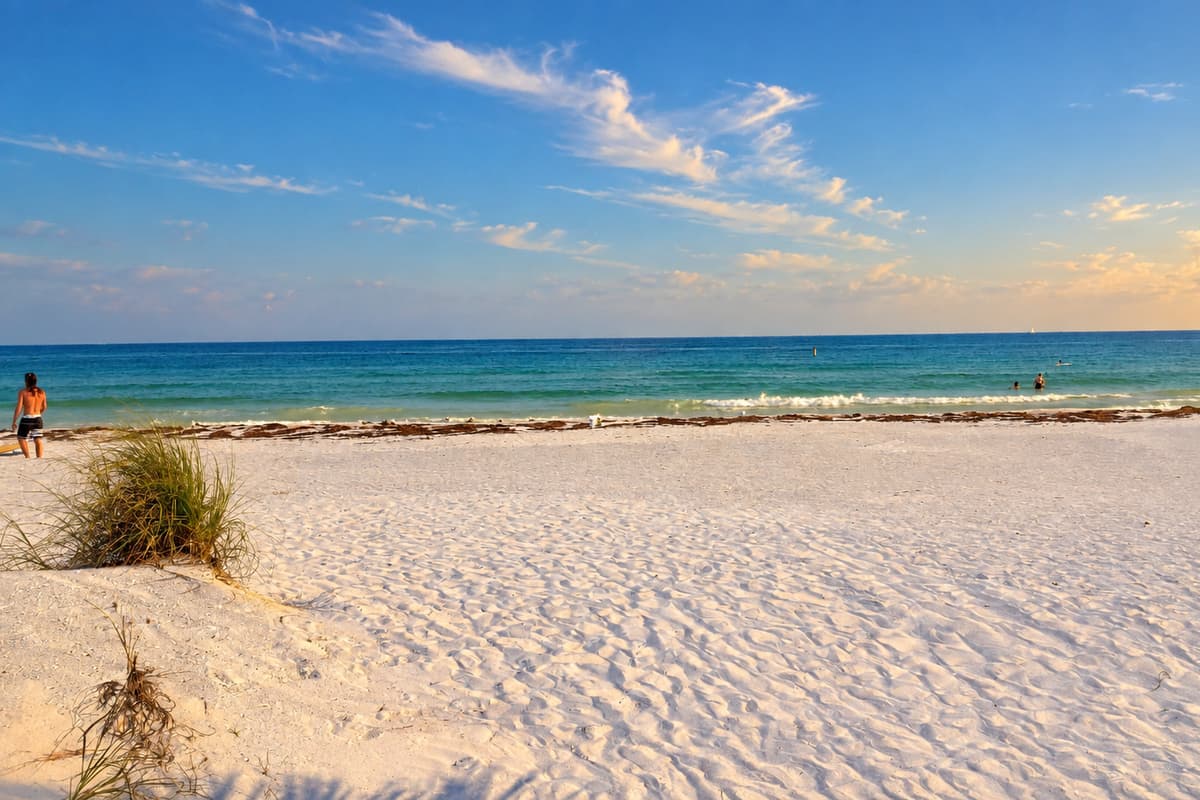 As the sky transforms into a masterpiece of vibrant colors, find a cozy spot on the beach and witness nature's breathtaking display. 