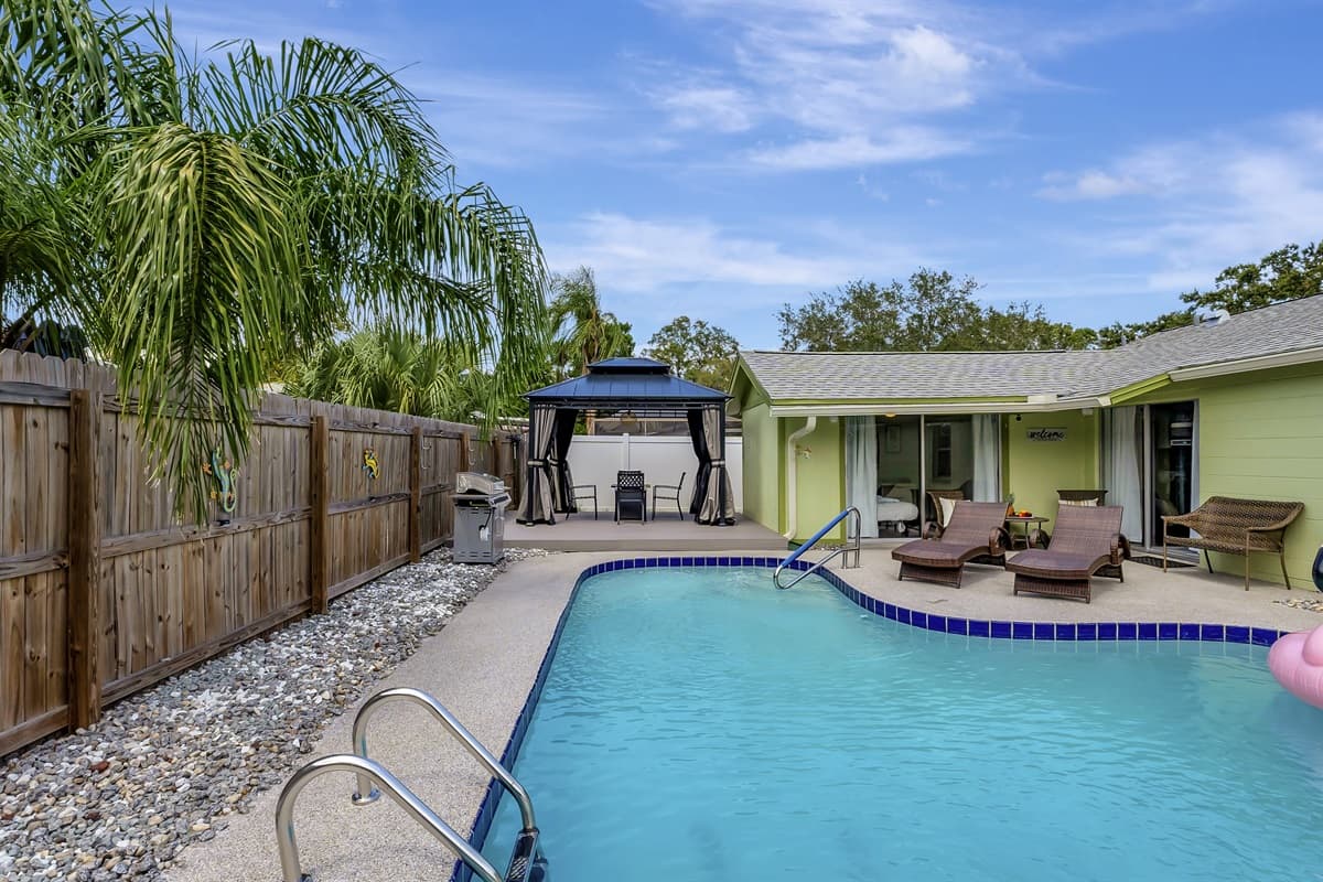 Our pool area is thoughtfully designed for both safety and aesthetics.
