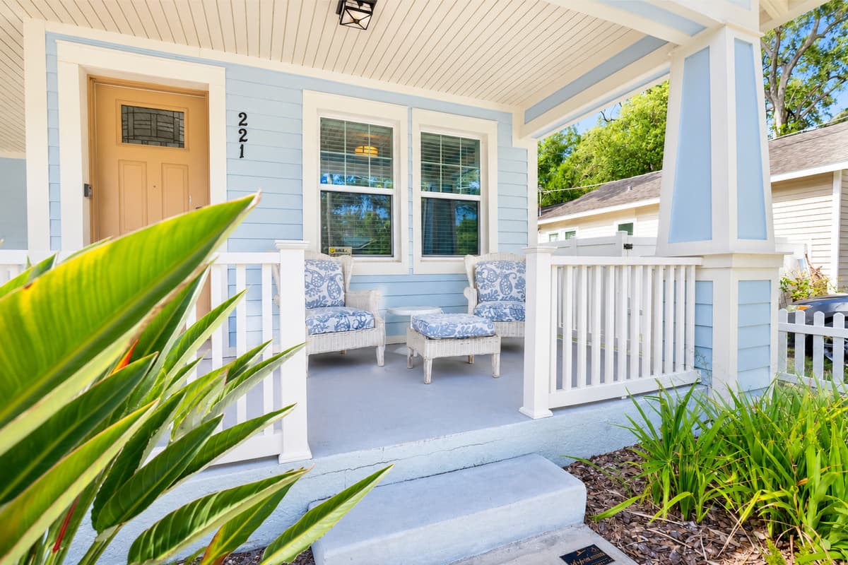 Start your mornings with a cup of coffee or unwind in the evening on the welcoming front porch with comfortable seating.