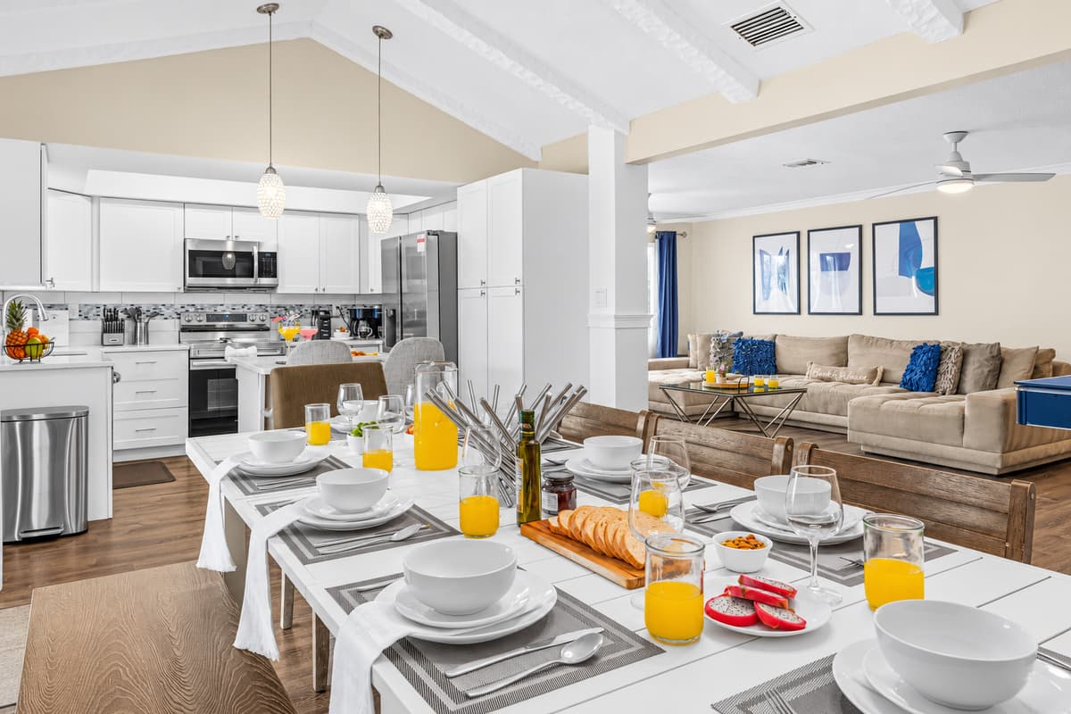 Open-concept dining, kitchen, and living area designed for effortless entertaining.