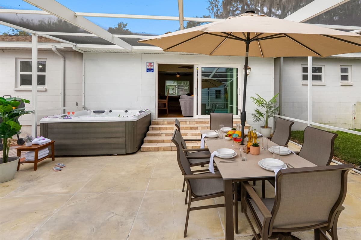 Cozy and private, this hot tub area is ideal for relaxing under the Florida sky.