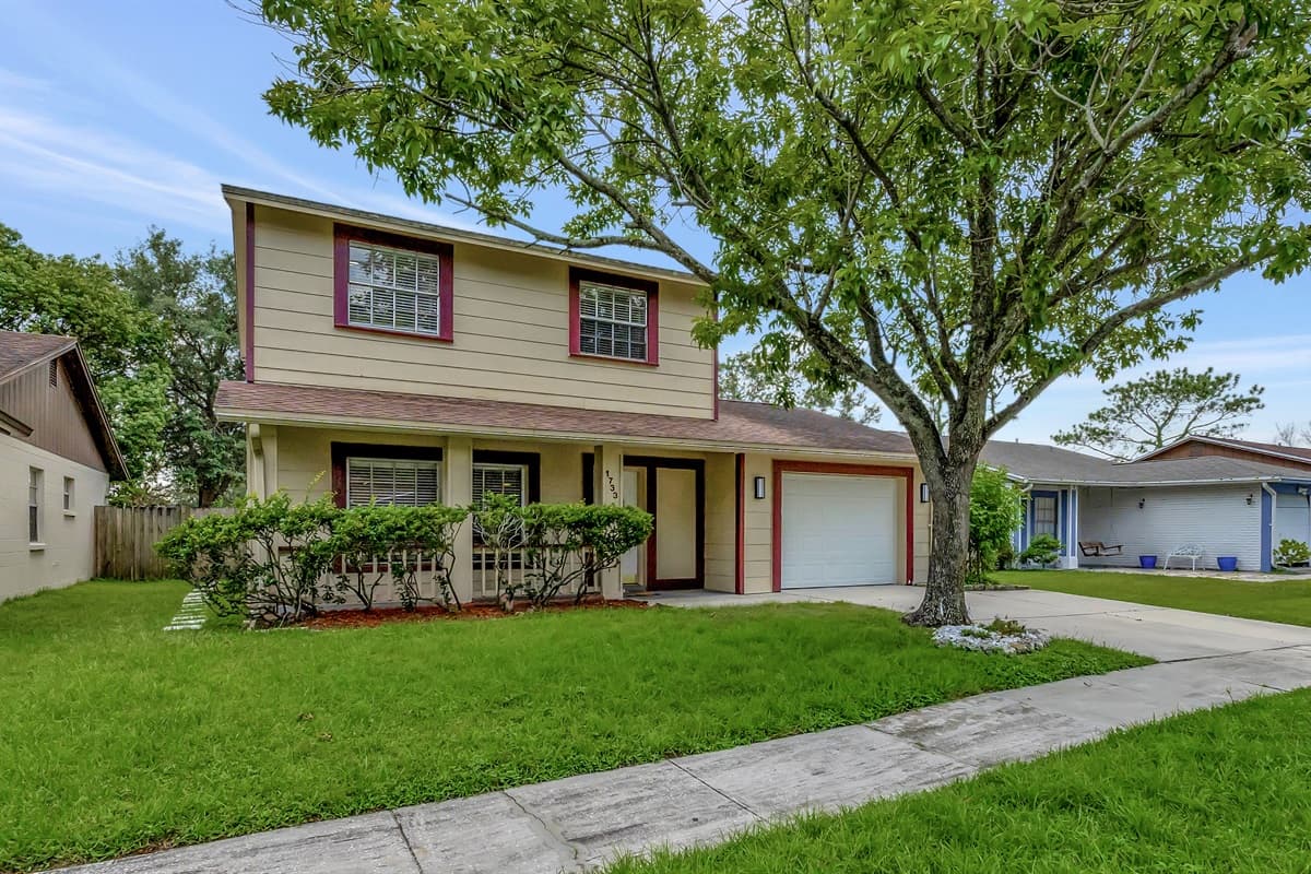Picture-perfect greenery surrounds a pristine lawn.