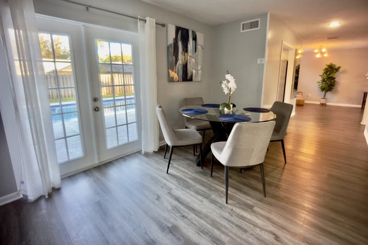 The stylish dining area provides ample seating for a memorable dining experience.