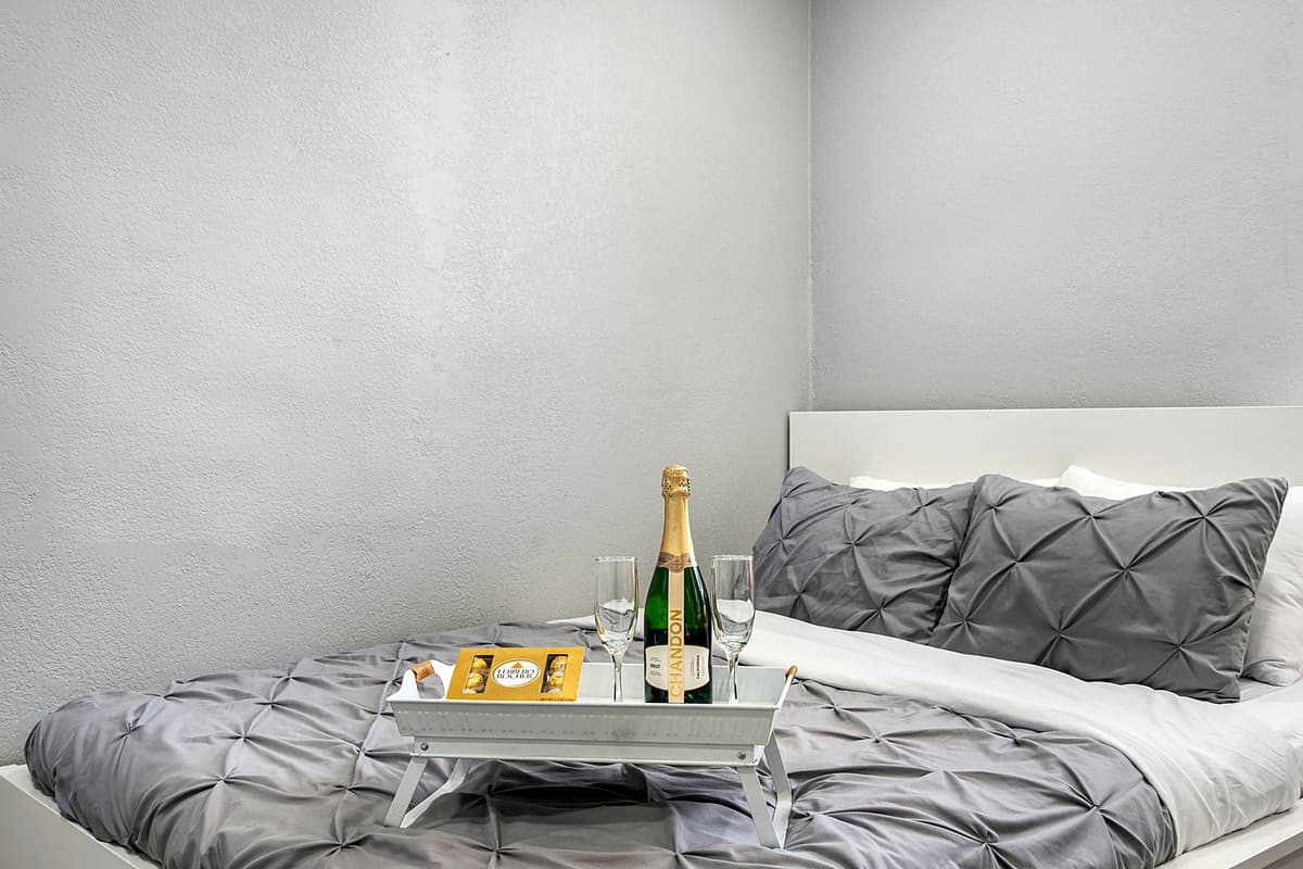 Soft lighting, high-quality linens, and carefully chosen furnishings create a serene atmosphere perfect for unwinding after a long day.