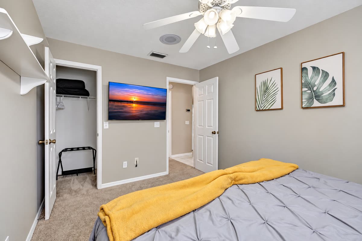 Cool breezes caress the room as a ceiling fan gently stirs the air, creating a soothing ambiance that lulls you into a state of pure tranquility.