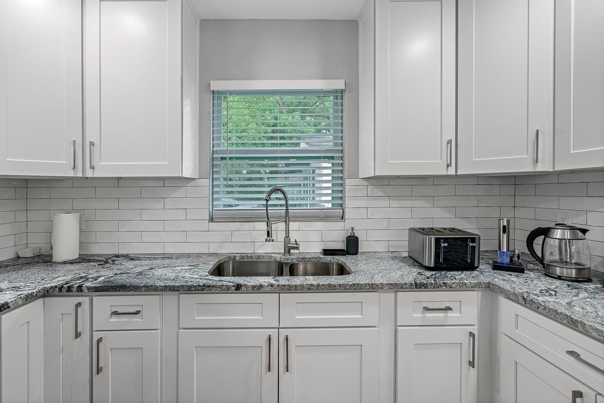 Our spacious modern kitchen has a lot of storage too! It's equipped with a dishwasher and has a lot of cabinets and drawers for kitchen tools and utensils. If you like this property, don't hesitate to send us a message.