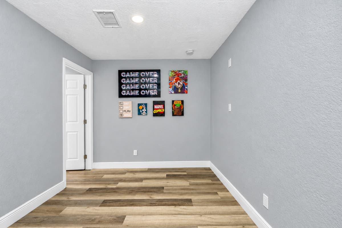 A dedicated space just for play. The game room sits apart from the main living area, so the noise stays here and the adults relax elsewhere. Kids get their own space, adults get the quiet.