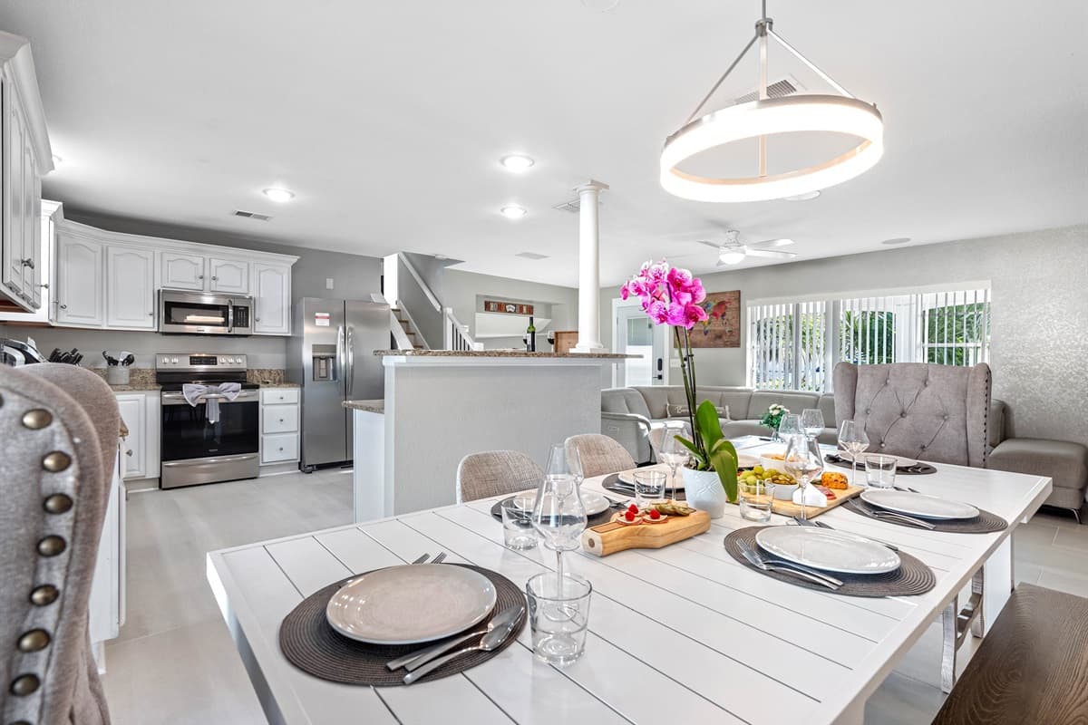 Immaculate dining area that seats 8 people adjacent to our fully equipped kitchen where you could make your favorite home cooked meals.