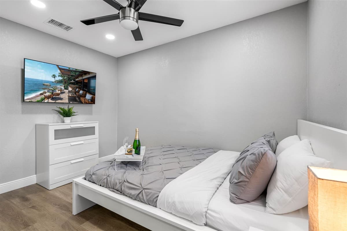 Whether you're enjoying a peaceful night's sleep or a lazy morning in bed, this bedroom is a haven of tranquility.