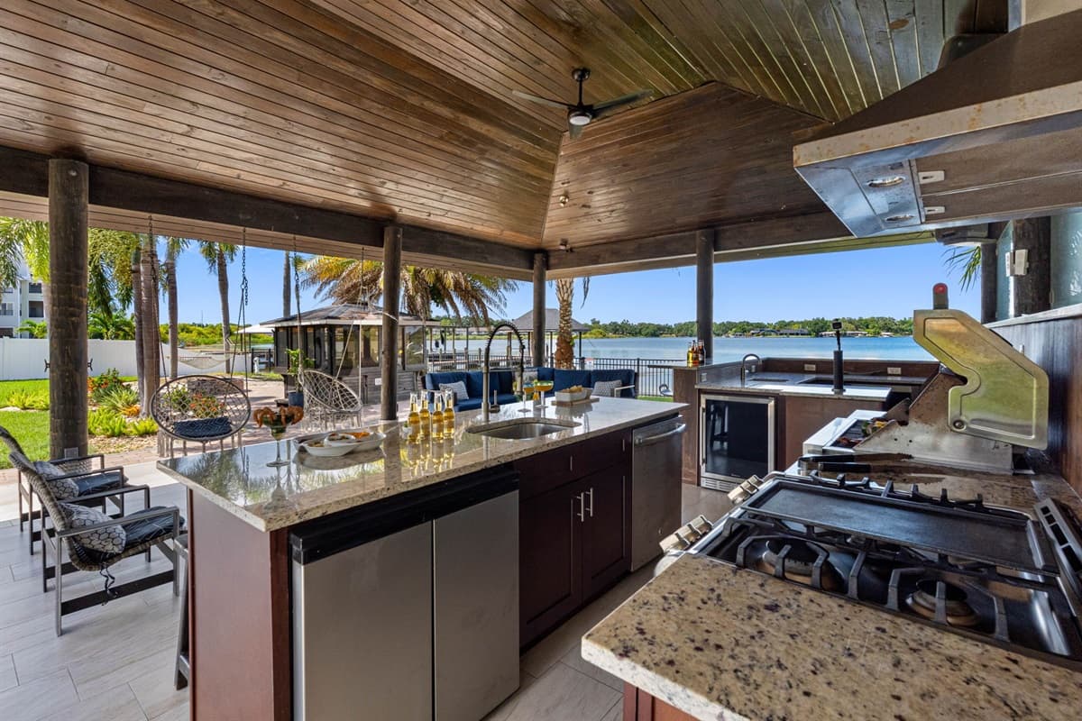 IMPORTANT NOTICE: Please note that the outdoor kitchen appliances are currently not functional, with the exception of the outdoor grill, which is fully operational and available for use.