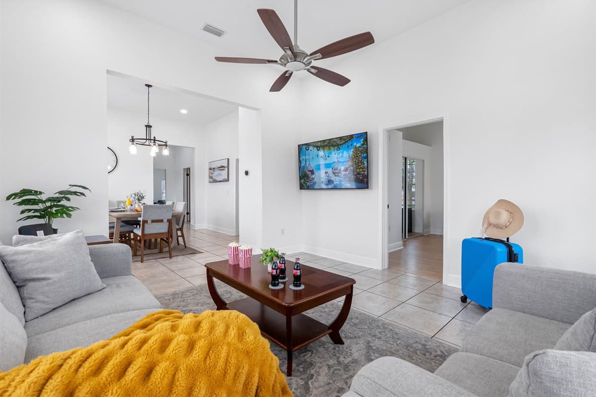Designed for comfort and style, the living room includes ample seating, soft neutral tones, and a relaxing space to unwind after a long day.