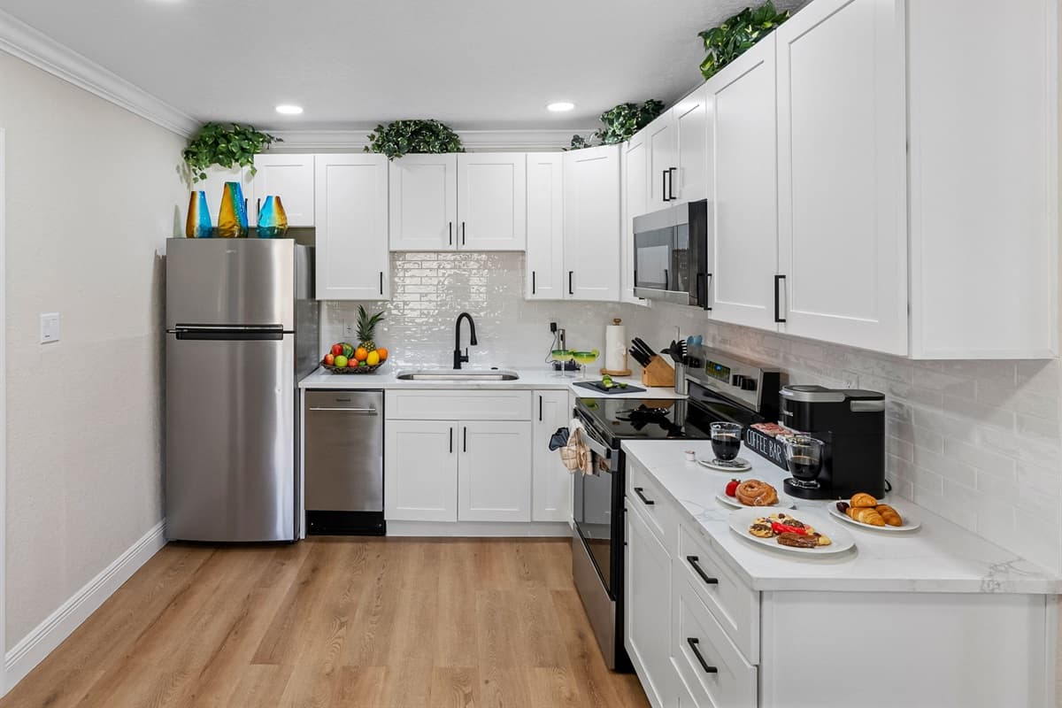 The full-size oven and stovetop, microwave, and large refrigerator make it easy to handle meals of any size, while the dishwasher ensures cleanup is a breeze.