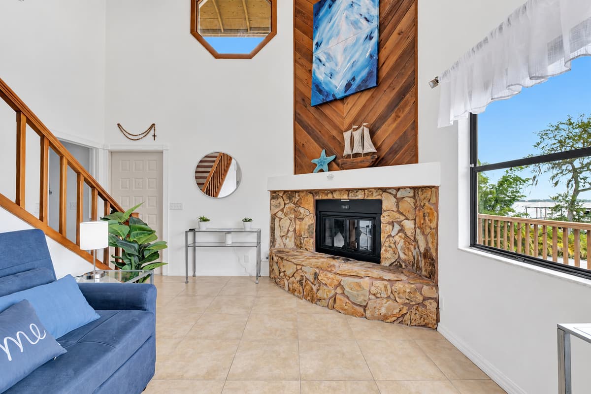 A haven of comfort and relaxation enhanced by the warmth and charm of a fireplace.
