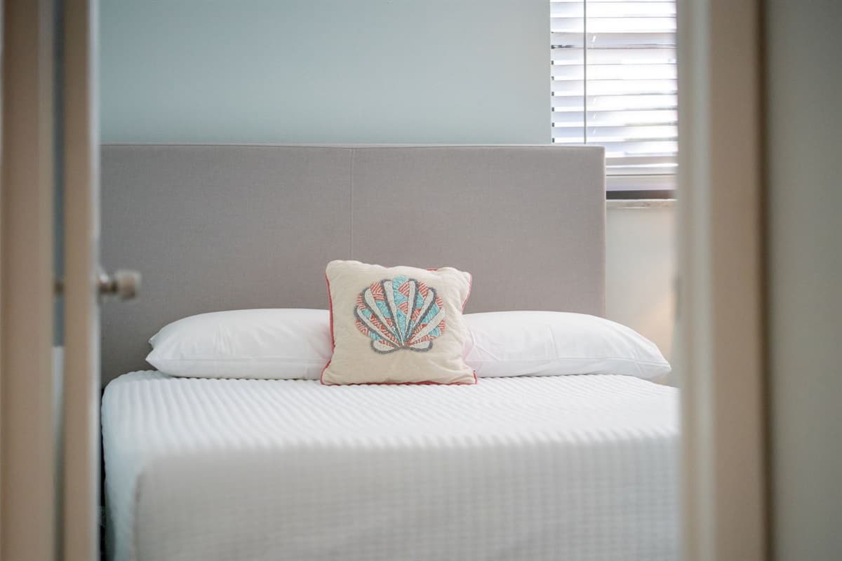 Each bed is dressed in soft, high-quality linens to ensure a restful and cozy night’s sleep.