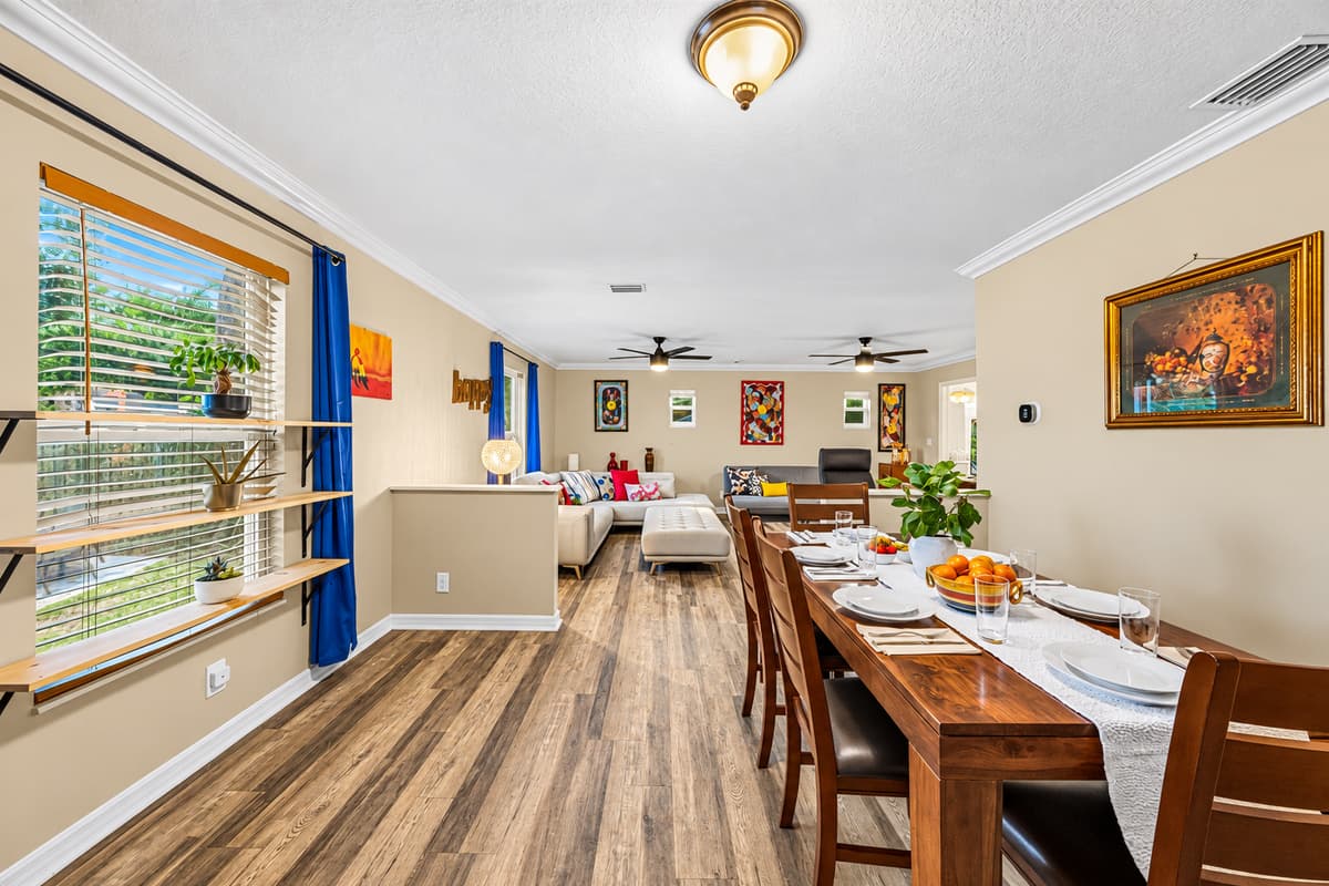 Spacious dining area with large table and natural light—perfect for group meals and gatherings.