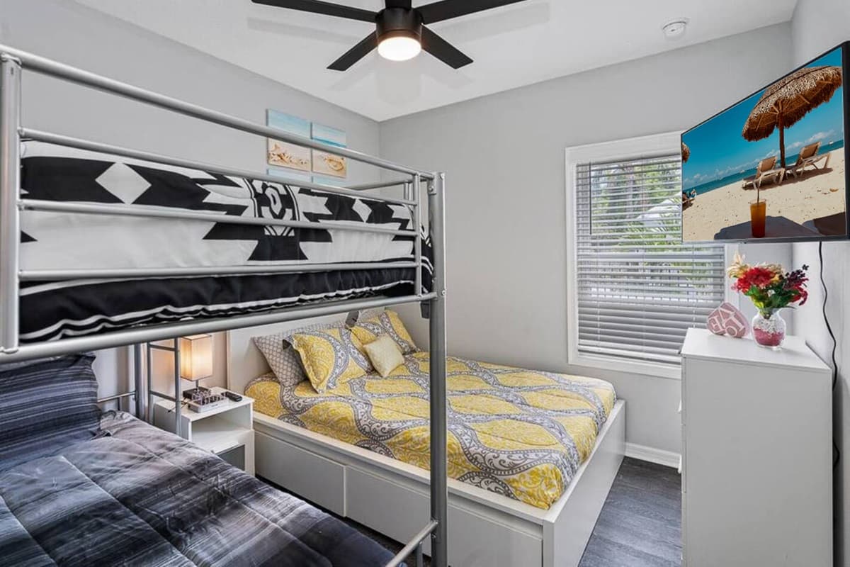 This bedroom is perfect for a small family or a group of friends who wants to hang out and sleep in one room. It is very spacious and has a very nice view.